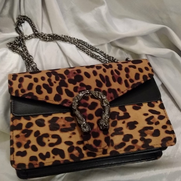 Leapord print faux suede NWOT